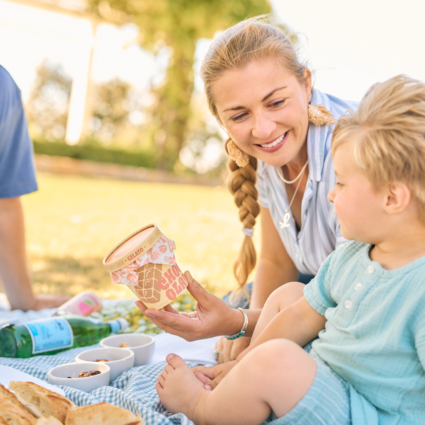 family enjoying picnic