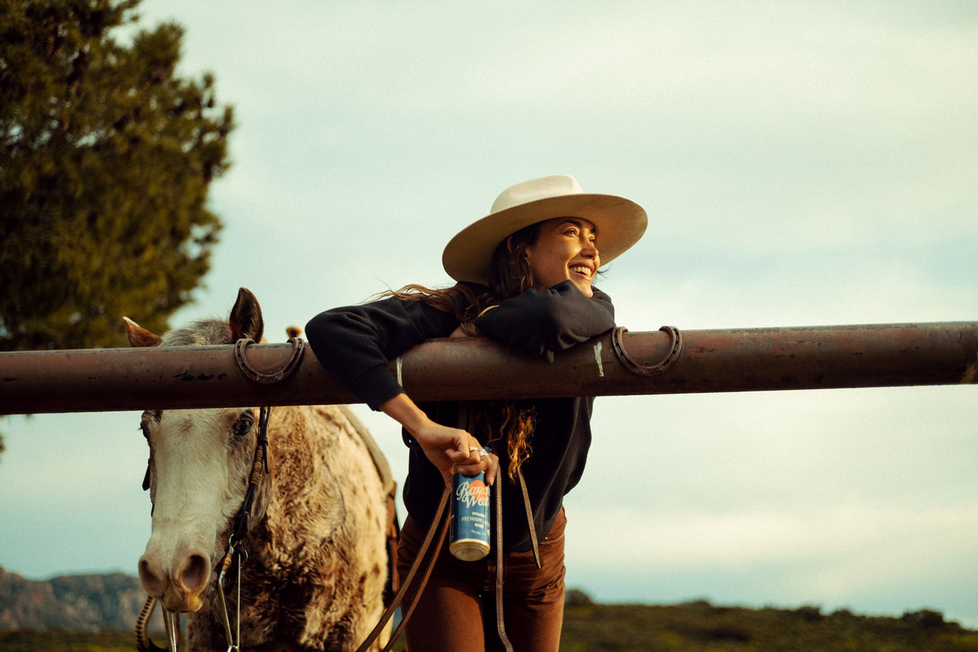 girol with horse and holding rancho 